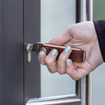 Kreativer Schlüsselbundorganisator aus Leder