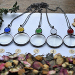 Elegante Halskette mit Lupenanhänger